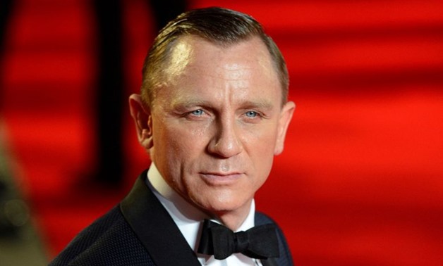 FILE PHOTO: Actor Daniel Craig arrives for the royal world premiere of the new 007 film "Skyfall" at the Royal Albert Hall in London October 23, 2012. REUTERS/Paul Hackett/File Photo