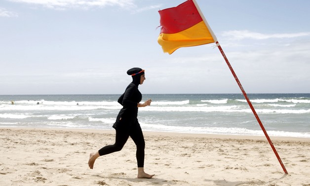 FILE: The decision added that Burkini should not be banned if its material is the same as the one of an ordinary swimming suit.