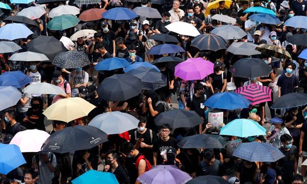 People march during a protest in Hong Kong, China, August 24, 2019. REUTERS/Kai Pfaffenbach

