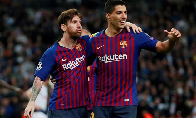 Barcelona's Lionel Messi celebrates with Luis Suarez after scoring their fourth goal. Action Images via Reuters/Andrew Couldridge/File Photo

