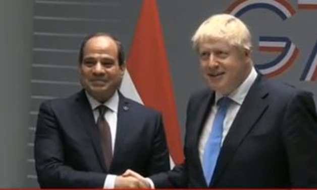 President Abdel Fatah al-Sisi met with British Prime Minister Boris Johnson in France - Press Photo