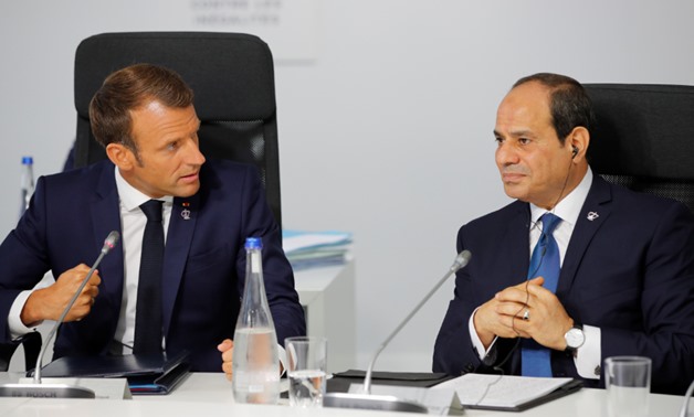 Egyptian President Abdel Fattah al-Sisi (R) meets with France's President Emmanual Macron on the sidelines of the G7 summit in Biarritz – SAA/Reuters