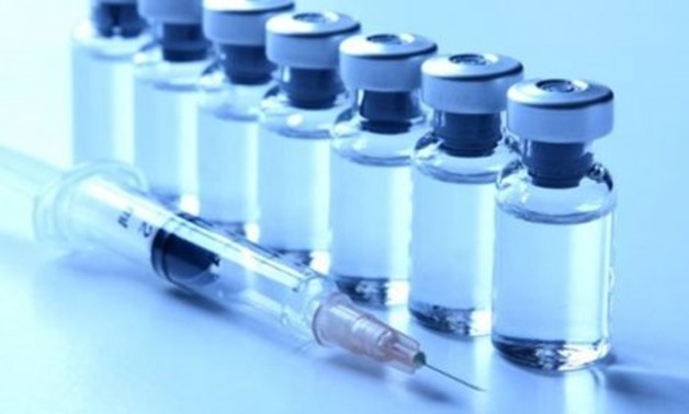 FILE - Vials and syringe - REUTERS 