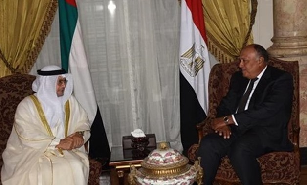 Foreign Minister Sameh Shoukry (R) and UAE Minister of State for Foreign Affairs Anwar Qarqash (L) - Photo via SIS
