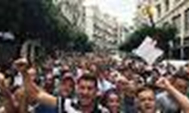 Demonstrators shout slogans during a protest demanding the removal of the ruling elite in Algiers, Algeria September 13, 2019. REUTERS/Abdelaziz Boumzar
