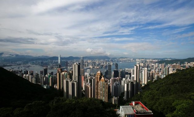 FILE PHOTO: A general view of Victoria Harbour and downtown skyline is seen from the Peak in Hong Kong, China August 4, 2017. REUTERS/Bobby Yip
