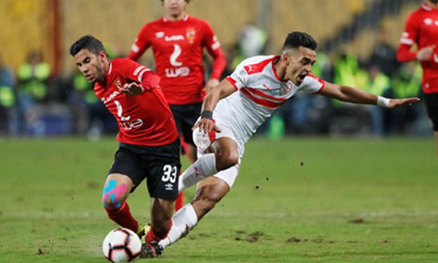 File- Al-Ahly’s Nasser Maher and Zamalek’s Youssef Obama battle for the ball, Reuters 