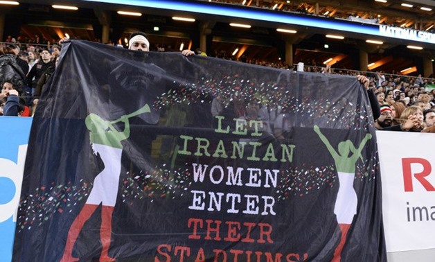 Supporters hold a banner reading ‘Let Iranian women enter their stadiums’ during the football match between Sweden and Iran at the Friends Arena in Solna near Stockholm in this March 31, 2015 file photo. (AFP)
