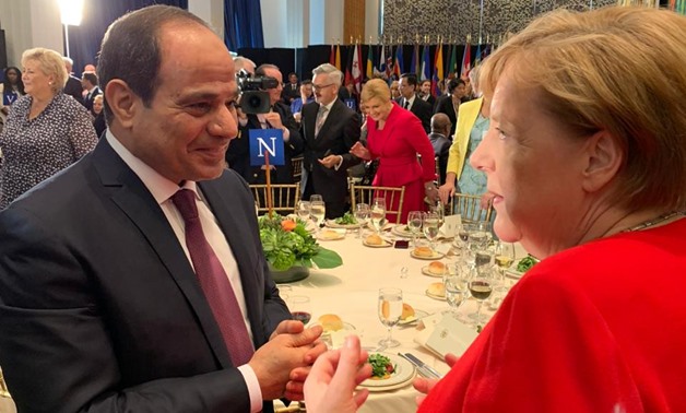 Egyptian President Abdel Fatah al Sisi talks with the German Chancellor Angela Merkel during the dinner banquet on the sidelines of the UNGA: press photo