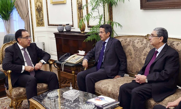 Prime Minister Mostafa Madbouly (L) in a meeting with Chairman of Acwa Power Mohamed Abdullah Abou Neyan and Minister of Electricity and Renewable Energy Mohamed Shaker (R) in the cabinet’s headquarters in Cairo, Egypt. September 27, 2019. Press Photo