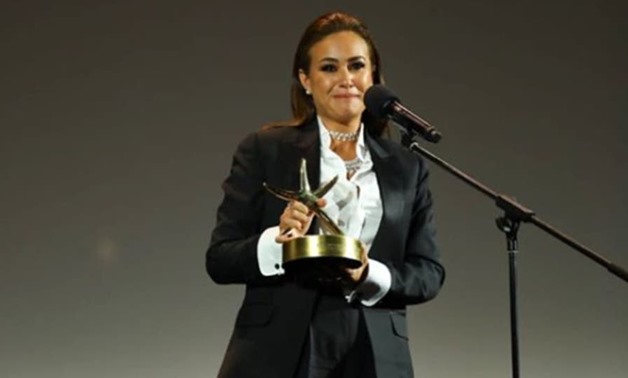File - Hend Sabry while receiving her award at El Gouna Film Festival.