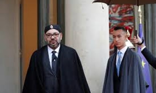 FILE PHOTO - Morocco's King Mohammed VI and his son Crown Prince Moulay Hassan arrive at the Elysee Palace as part of the commemoration ceremony for Armistice Day, 100 years after the end of the First World War, in Paris, France, November 11, 2018. REUTER