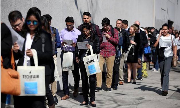People wait in line to attend TechFair LA, a technology job fair - REUTERS/Lucy Nicholson/File Photo