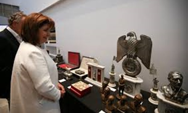 Argentine Security Minister Patricia Bullrich looks at Nazi artefacts before a news conference at the Holocaust museum in Buenos Aires, Argentina October 2, 2019. REUTERS/Agustin Marcarian
