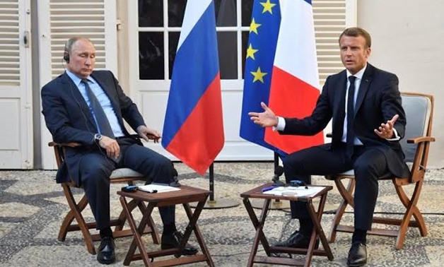 FILE PHOTO: French President Emmanuel Macron meets Russia's President Vladimir Putin, at his summer retreat of the Bregancon fortress on the Mediterranean coast, near the village of Bormes-les-Mimosas, southern France, on August 19, 2019. Gerard Julien/Po