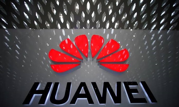 FILE PHOTO: A Huawei company logo is pictured at the Shenzhen International Airport in Shenzhen, Guangdong province, China July 22, 2019. REUTERS/Aly Song
