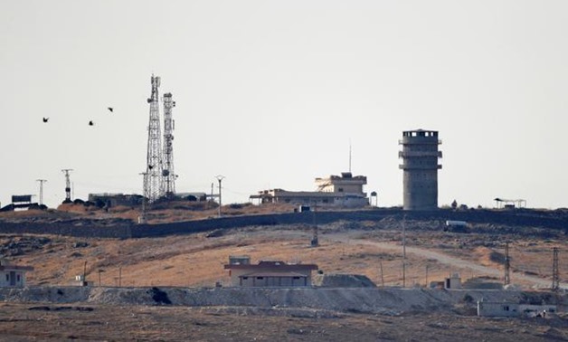 An abandoned U.S. observation post is seen from the Turkish border town of Suruc, in Sanliurfa province, Turkey, October 14, 2019. REUTERS/Murad Sezer