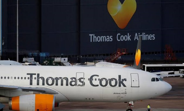 FILE PHOTO: A grounded airplane with the Thomas Cook livery is seen at Manchester Airport, Manchester, Britain September 23, 2019. REUTERS/Phil Noble