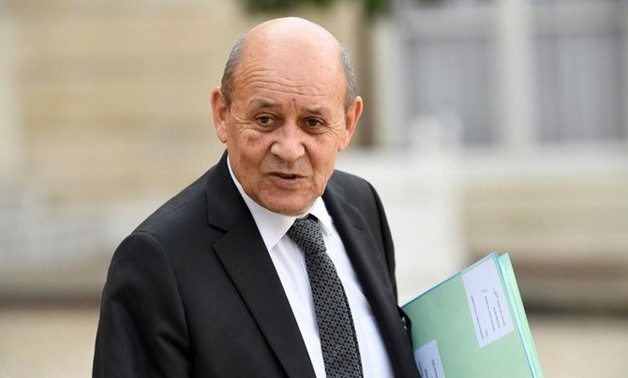 The French FM Jean-Yves Le Drian wants to find a way to have a judicial mechanism that is able to judge Daesh fighters. (File/AFP)
