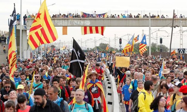 Hundreds of protesters faced off against police in the heart of Barcelona on Friday