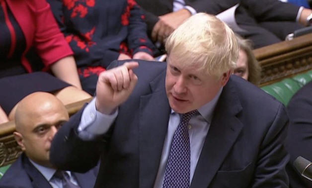 FILE PHOTO: Britain's Prime Minister Boris Johnson speaks at the House of Commons as parliament discusses Brexit, sitting on a Saturday for the first time since the 1982 Falklands War, in London, Britain, October 19, 2019, in this screen grab taken from v