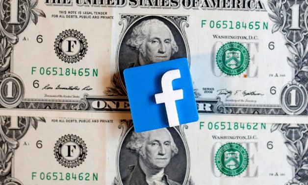 FILE PHOTO: A 3-D printed Facebook logo is seen on U.S. dollar banknotes in this illustration picture, June 18, 2019. REUTERS/Dado Ruvic/Illustration/File Photo
