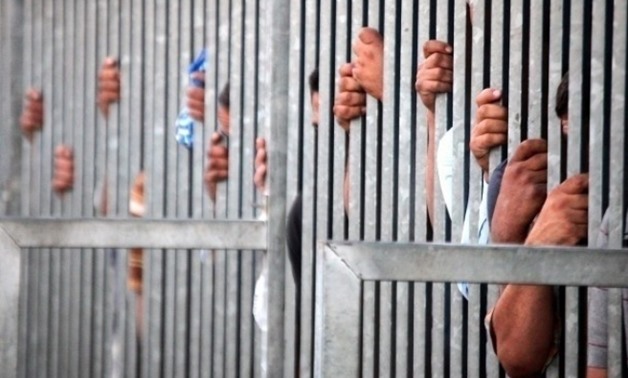 FILE- Palestinian prisoner continues hunger strike for 100 days