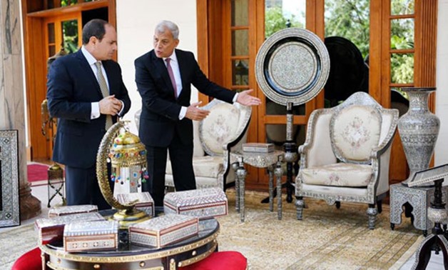 FILE: President Abdel Fatah al-Sisi with Governor of Monifia 