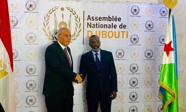 PRESS: Egyptian ambassador to Djibouti Mostafa Mohamed Urfi (L) shaking hands with (R) Djibouti's Speaker of Parliament Mohamed Ali Hamad