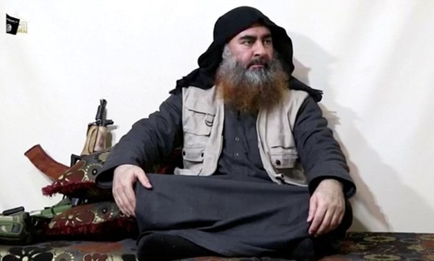 The man assumed to be Abu Bakr al-Baghdadi appears in a video released on April 29, 2019. AL FURQAN MEDIA NETWORK / REUTERS TV VIA REUTERS