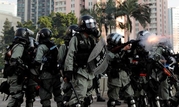 Riot police run during a protest on China's National Day in Hong Kong, China October 1, 2019. REUTERS/Susana Vera

