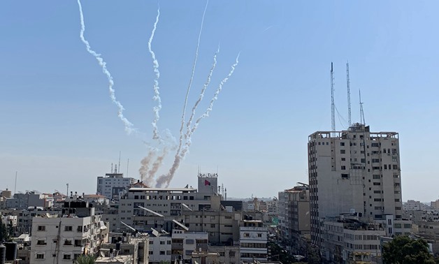 Trails of smoke are seen as rockets are fired from Gaza towards Israel, in Gaza November 14, 2019. REUTERS/Suhaib Salem TPX IMAGES OF THE DAY

