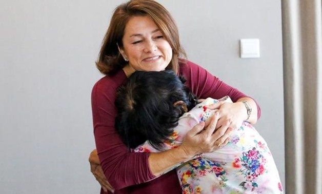 Leigh Boughton Small hugs her mother Nguyen Thi Dep as she enters the hotel suite on their reunion day after 44 years apart, in Ho Chi Minh City, Vietnam November 17, 2019. Nguyen gave up her 3-year-old daughter during "Operation Babylift" in 1975 before 