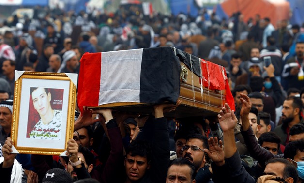 Mourners carry the coffin during the funeral of a demonstrator who was killed at an anti-government protest overnight in Najaf, Iraq November 29, 2019. REUTERS/Alaa al-Marjani
