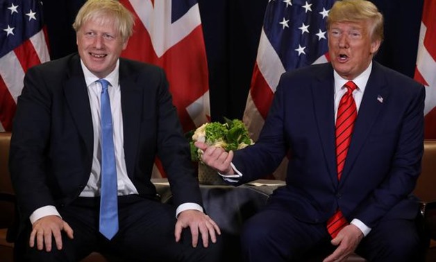 FILE PHOTO: U.S. President Donald Trump holds a bilateral meeting with British Prime Minister Boris Johnson (L) on the sidelines of the annual United Nations General Assembly in New York City, New York, U.S., September 24, 2019. REUTERS/Jonathan Ernst/Fil