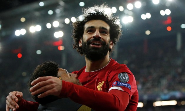 FILE PHOTO: Soccer Football - Champions League - Group E - FC Salzburg v Liverpool - Red Bull Arena Salzburg, Salzburg, Austria - December 10, 2019 Liverpool's Mohamed Salah celebrates scoring their second goal with Alex Oxlade-Chamberlain Action Images v