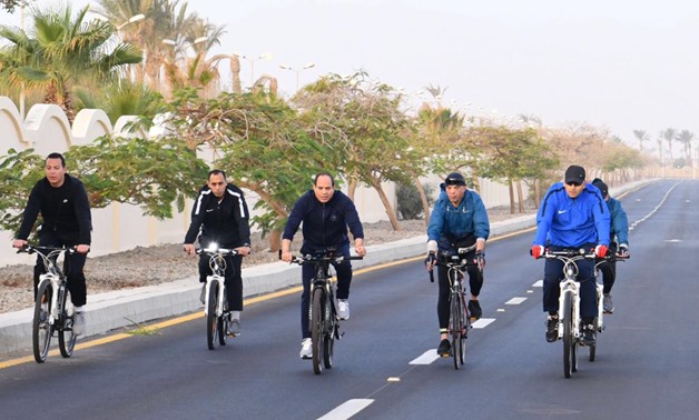 President Abdel Fatah al-Sisi went on a bike tour on Saturday in the Red Sea city of Sharm el Shiekh on the sideline of the World Youth Forum - Press Photo