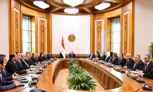 President Abdel Fattah el-Sisi on Sunday met with Prime Minister Mostafa Madbouli and the newly-appointed ministers and their deputies after they took the oath - C