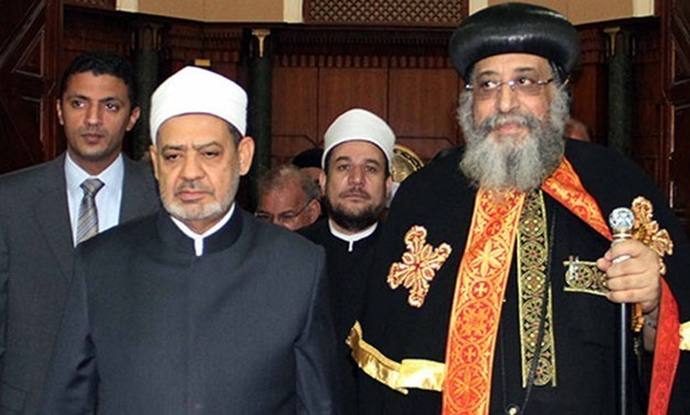 FILE - Pope Tawadros II of Alexandria and Al-Azhar Grand Imam Ahmed al-Tayeb