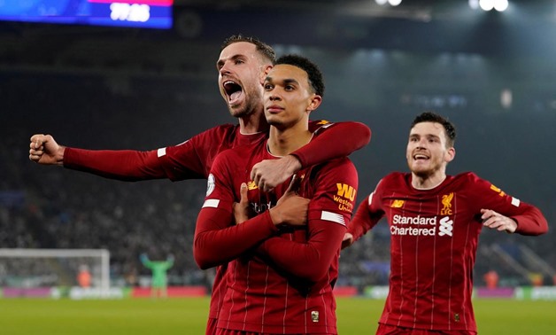 Soccer Football - Premier League - Leicester City v Liverpool - King Power Stadium, Leicester, Britain - December 26, 2019 Liverpool's Trent Alexander-Arnold celebrates scoring their fourth goal with Jordan Henderson and Andrew Robertson REUTERS/Andrew Ya