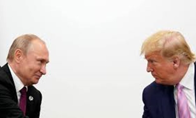 FILE PHOTO: U.S. President Donald Trump meets with Russian President Vladimir Putin at the G20 leaders summit in Osaka, Japan June 28, 2019. REUTERS/Kevin Lamarque/File Photo
