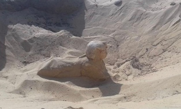 File- A small royal statue of a sphinx was uncovered in Tuna El-Gebel. 