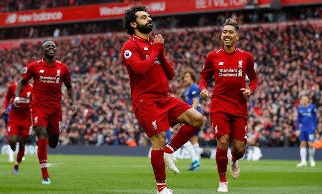 Salah celebrates scoring against Chelsea, Reuters
