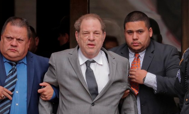 FILE PHOTO: Film producer Harvey Weinstein exits following a hearing in his sexual assault case at New York State Supreme Court in New York, U.S., December 6, 2019. REUTERS/Lucas Jackson