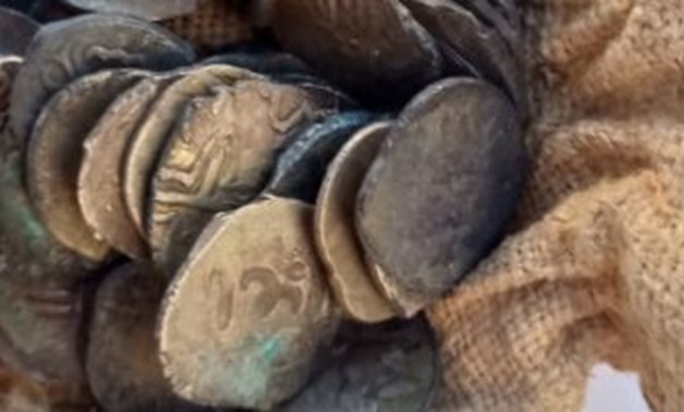 File -some of the uncovered coins.