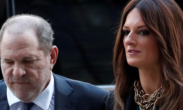 FILE PHOTO: Film producer Harvey Weinstein and his attorney Donna Rotunno arrive at New York State Supreme Court for a hearing on hiring of new lawyers in his rape case in New York, U.S., July 11, 2019. REUTERS/Mike Segar