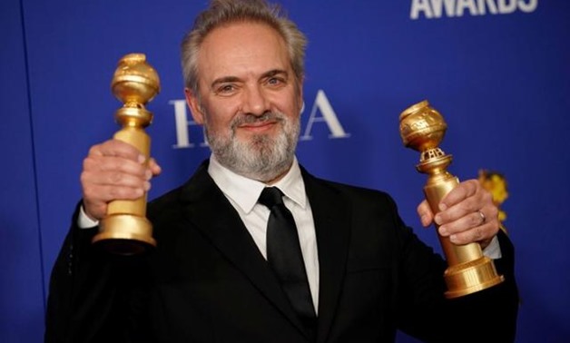 FILE PHOTO: 77th Golden Globe Awards - Photo Room - Beverly Hills, California, U.S., January 5, 2020 - Sam Mendes poses backstage with his awards for Best Director - Motion Picture and Best Motion Picture - Drama for "1917" . REUTERS/Mike Blake.