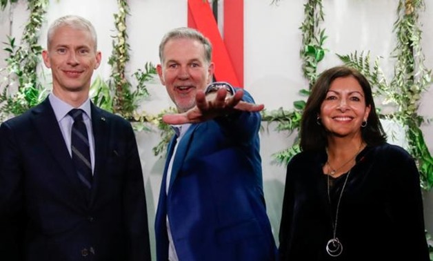 French Culture Minister Franck Riester, Reed Hastings, co-founder and CEO of Netflix and Paris Mayor Anne Hidalgo attend the inauguration of Netflix new offices in Paris, France, January 17, 2020. REUTERS/Gonzalo Fuentes.
