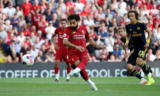 Soccer Football - Premier League - Liverpool v Arsenal - Anfield, Liverpool, Britain - August 24, 2019 Liverpool's Mohamed Salah scores their second goal from the penalty spot Action Images via Reuters/Carl Recine