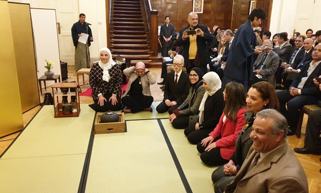 Side of the Japanese traditional tea ceremony hosted at the Japan's Ambassador to Cairo's house, where Minister of Social Solidarity Nevin al-Qabbaj (L) participates in the ceremony Japanese Ambassador Masaki Noke. 